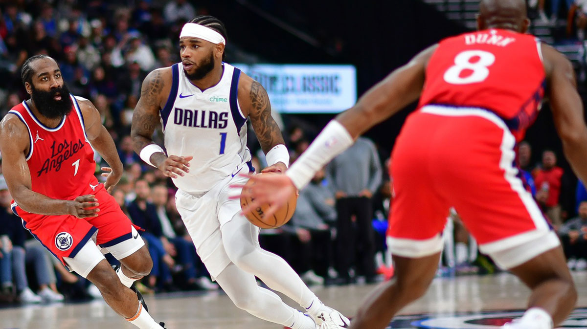 Mavericks guard Jaden Hardy dribbles