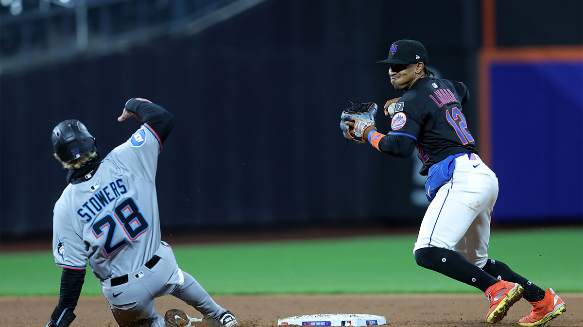 New York Mets shortstop Francisco Lindor (12) steps off second base after forcing out Miami Marlins right fielder Kyle Stowers (28) on a ground ball hit by Marlins second baseman Otto Lopez (not pictured) during the sixth inning at Citi Field.