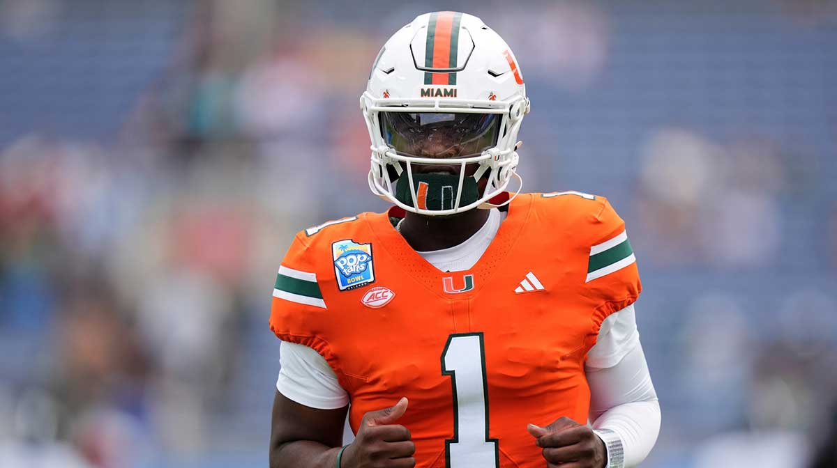 Miami Hurricanes quarterback Cam Ward (1) warms up prior to the game against the Iowa State Cyclones at Camping World Stadium.