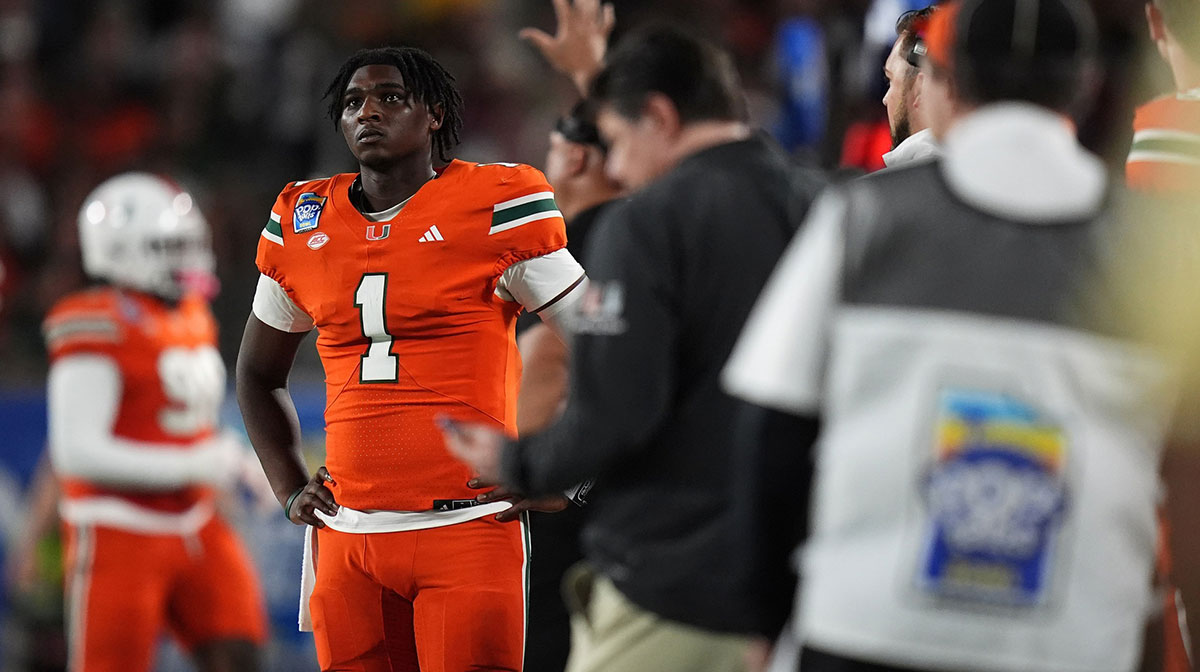 Miami Hurricanes quarterback Cam Ward (1) looks up at the scoreboard during the second half against the Iowa State Cyclones at Camping World Stadium.