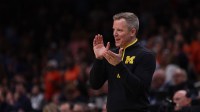Michigan Wolverines head coach Dusty May in the second half of a South Regional semifinal of the 2025 NCAA tournament against the Auburn Tigers at State Farm Arena.