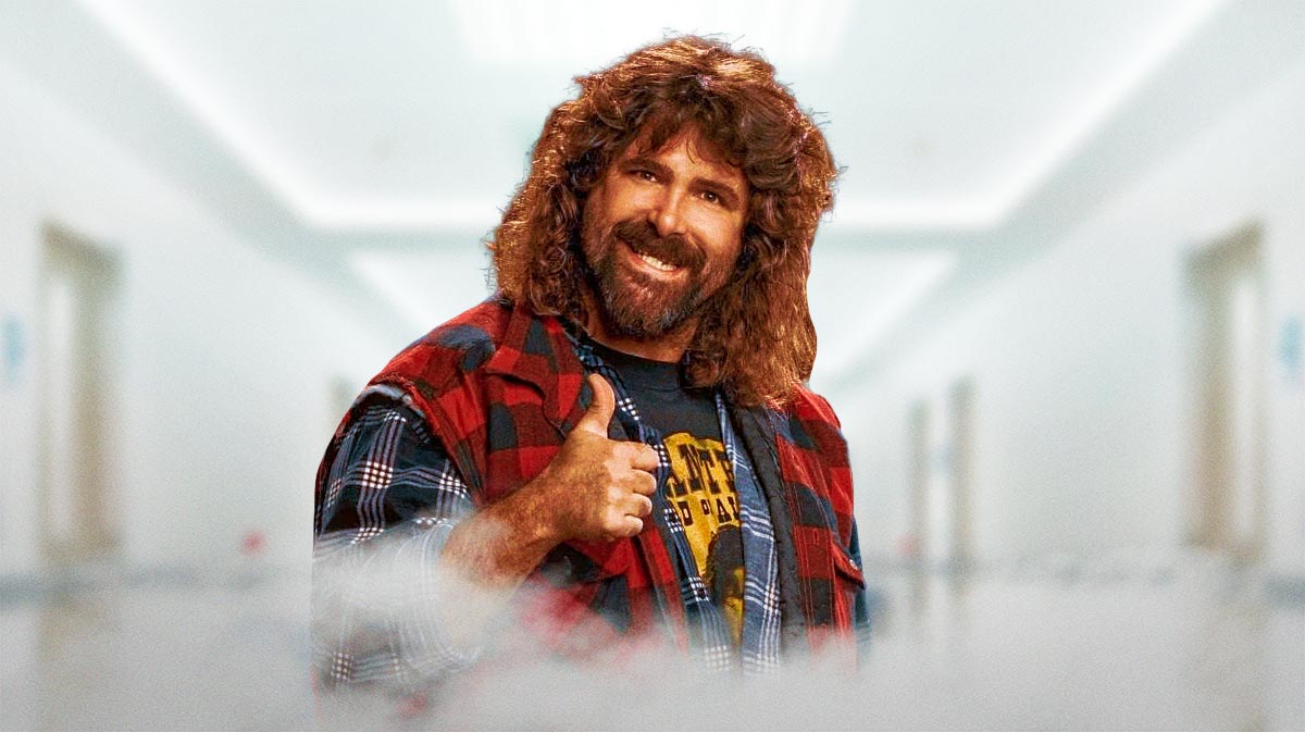 WWE legend Mick Foley with hospital background after he was in a car accident.