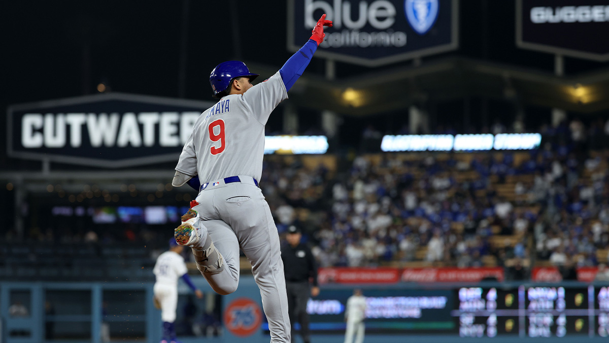 Chicago Cubs catcher Miguel Amaya (9) reacts after hitting a two run home run against the Los Angeles Dodgers during the eighth inning at Dodger Stadium. Mandatory Credit: Kiyoshi Mio-Imagn Images