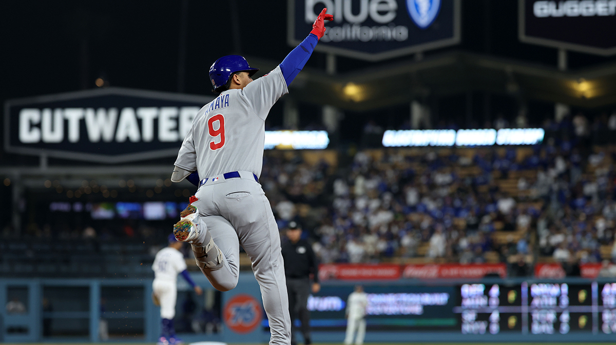 Chicago Cubs catcher Miguel Amaya (9) reacts after hitting a two run home run against the Los Angeles Dodgers during the eighth inning at Dodger Stadium.