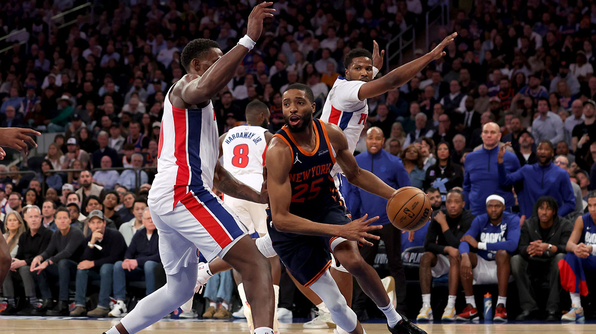 New York Knicks forward Mikal Bridges (25) controls the ball against Detroit Pistons center Jalen Duren (0) and guard Malik Beasley (5) during the third quarter of game two of the first round of the 2024 NBA Playoffs at Madison Square Garden.