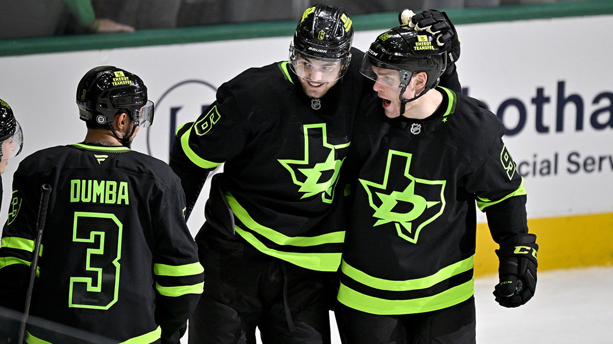 Dallas Stars defenseman Matt Dumba (3) and defenseman Lian Bichsel (6) and right wing Mikko Rantanen (96) celebrates a goal scored by Bichsel against the Nashville Predators during the third period at the American Airlines Center.