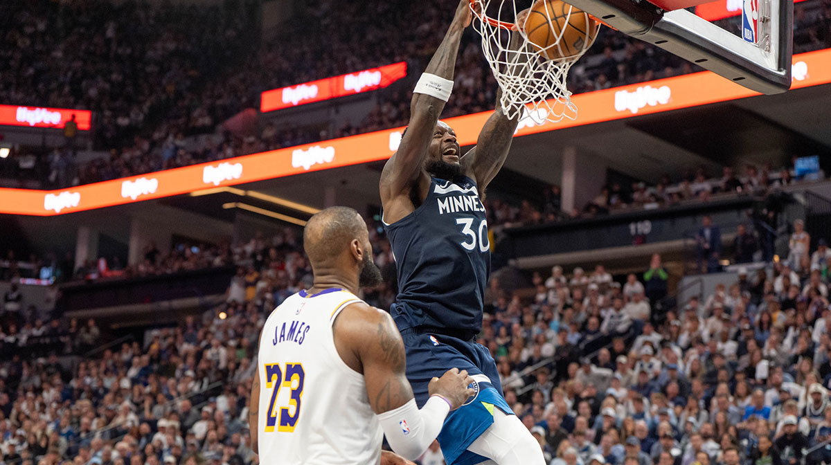 Apr 27, 2025; Minneapolis, Minnesota, USA; Minnesota Timberwolves forward Julius Randle (30) dunks after a whistle agains the Los Angeles Lakers in the fourth quarter during game four of first round for the 2025 NBA Playoffs at Target Center. Mandatory Credit: Matt Blewett-Imagn Images