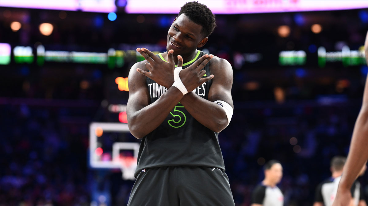 Minnesota Timberwolves guard Anthony Edwards (5) reacts after scoring against the Philadelphia 76ers in the fourth quarter at Wells Fargo Center.
