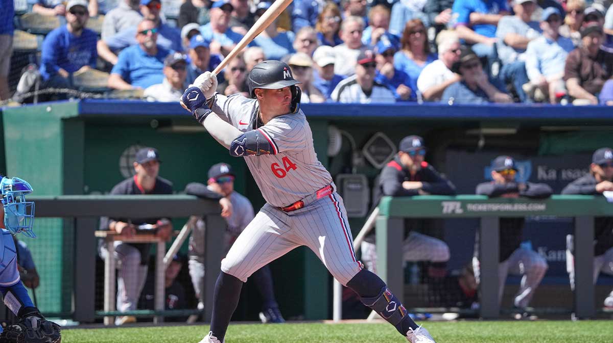 Minnesota Twins third base Jose Miranda (64) at bat against the Kansas City Royals during the game at Kauffman Stadium.
