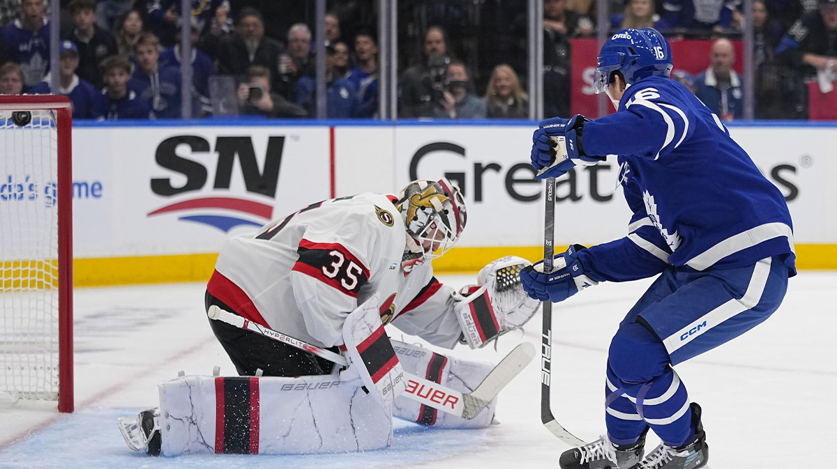 Toronto Maple Leafs forward Mitch Marner (16) scores on Ottawa Senators goaltender Linus Ullmark (35) during the first period of game one of the first round of the 2025 Stanley Cup Playoffs at Scotiabank Arena.