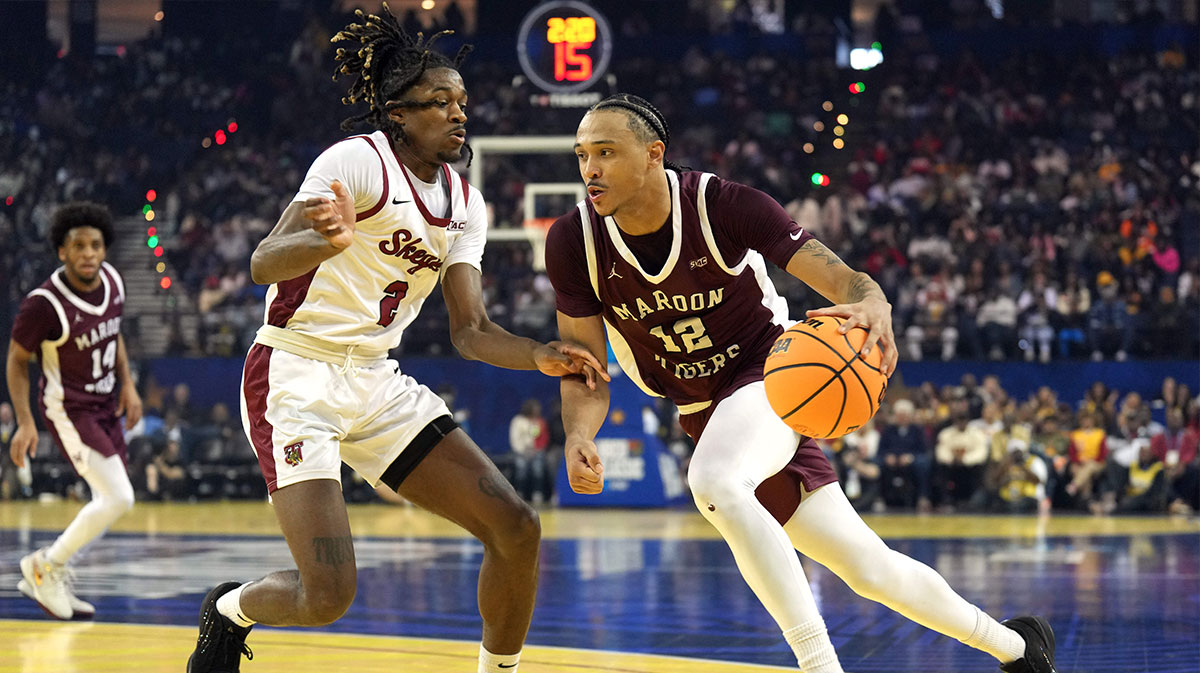 Morehouse Maroon Tigers guard Cedric Taylor III (12) dribbles against Tuskegee Golden Tigers forward Noah Goines (2) during the second half of the All Star-HBCU game