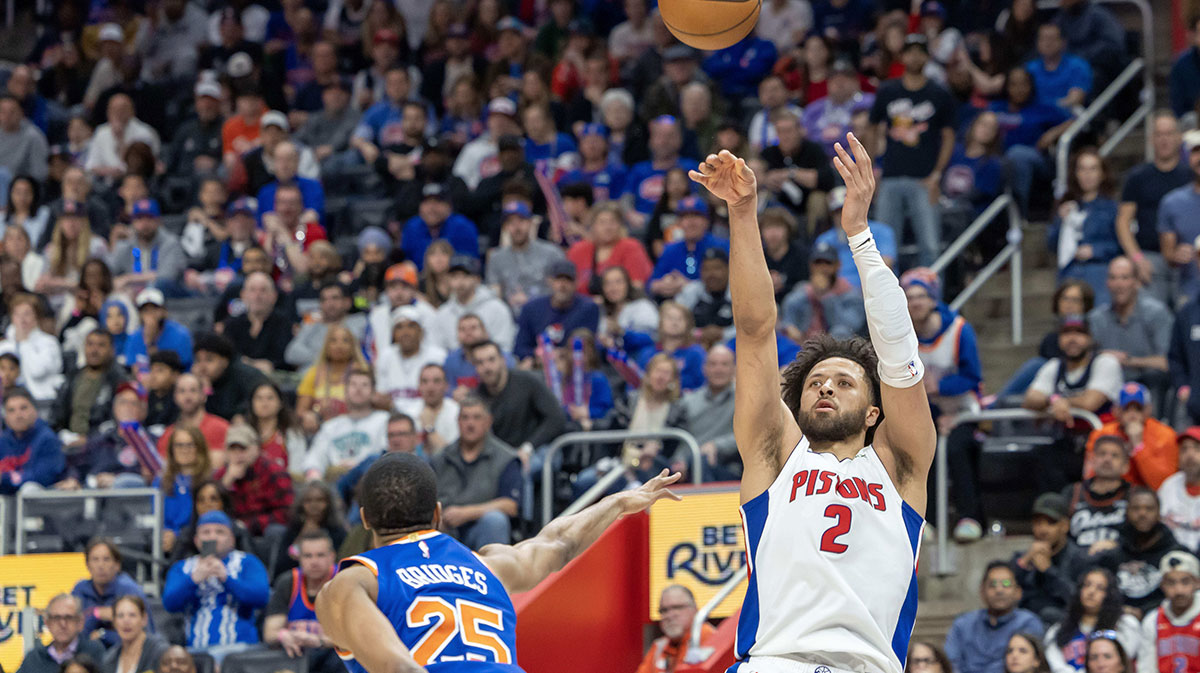 Detroit Pistons guard Cade Cunningham (2) shoots the ball as New York Knicks forward Mikal Bridges (25) defends during the fourth quarter of game four of first round for the 2025 NBA Playoffs at Little Caesars Arena.