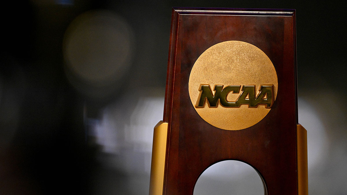 A view of the NCAA logo and trophy before the 2025 Women's National Gymnastics Championship at Dickies Arena.