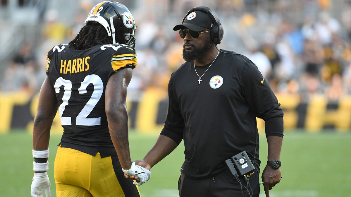 Pittsburgh Steelers head coaqch Mike Tomlin greets running back Najee Harris (22) after a sore against the Detroit Lions during the second quarter at Acrisure Stadium.