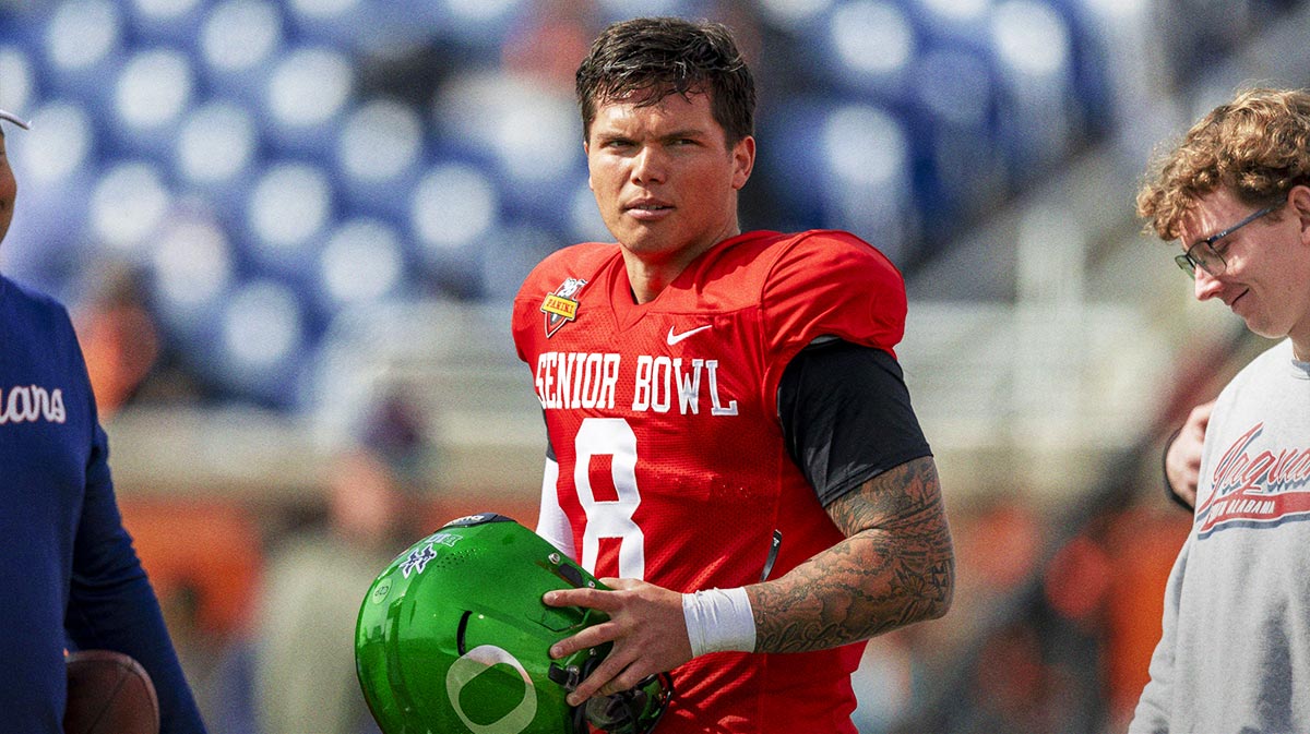 National team quarterback Dillon Gabriel of Oregon (8) pauses after practice during Senior Bowl practice for the National team at Hancock Whitney Stadium.