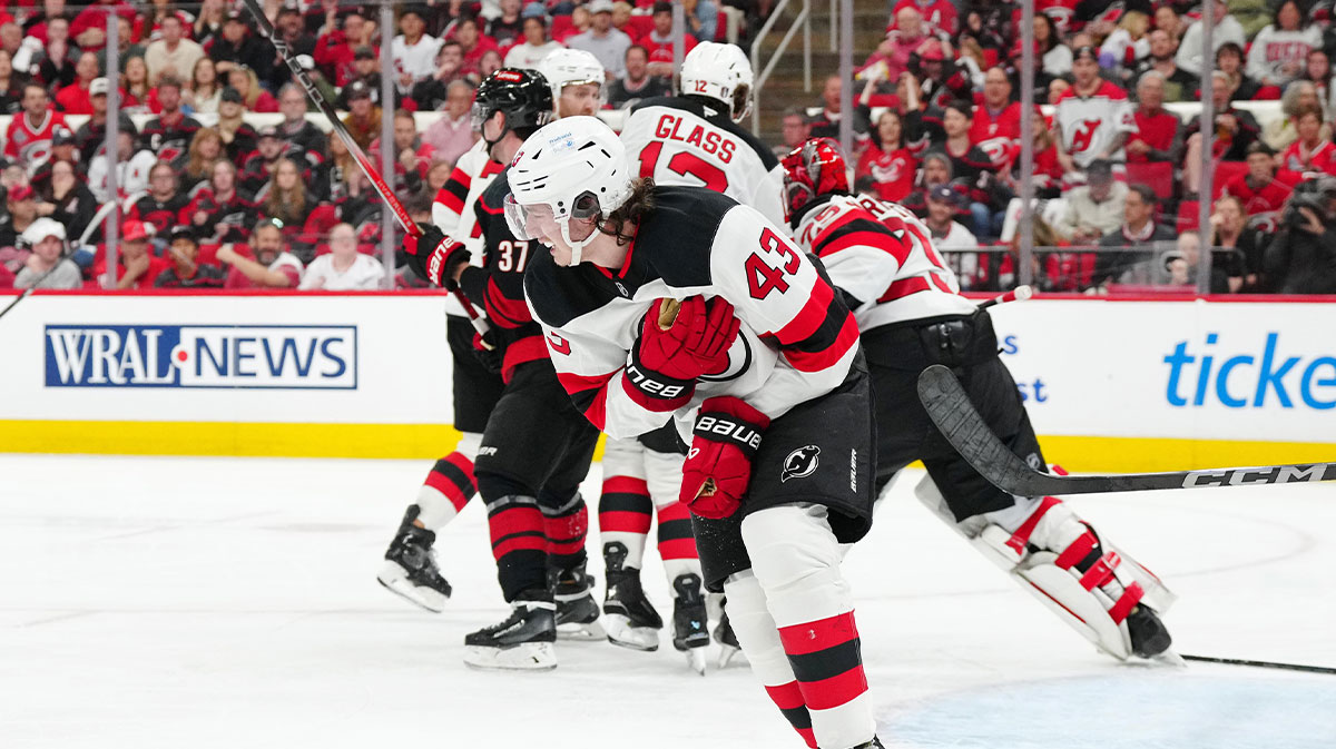 New Jersey Devils defenseman Luke Hughes (43) reacts after a play against the Carolina Hurricanes during the third period of game one of the first round of the 2025 Stanley Cup Playoffs at Lenovo Center