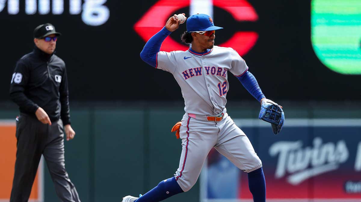 New York Mets shortstop Francisco Lindor (12) throws the ball to first base to get out Minnesota Twins first baseman Ty France (13) during the first inning at Target Field.