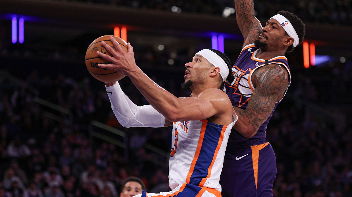 New York Knicks guard Josh Hart (3) goes to the basket against Phoenix Suns guard Bradley Beal (3) during the second half at Madison Square Garden.