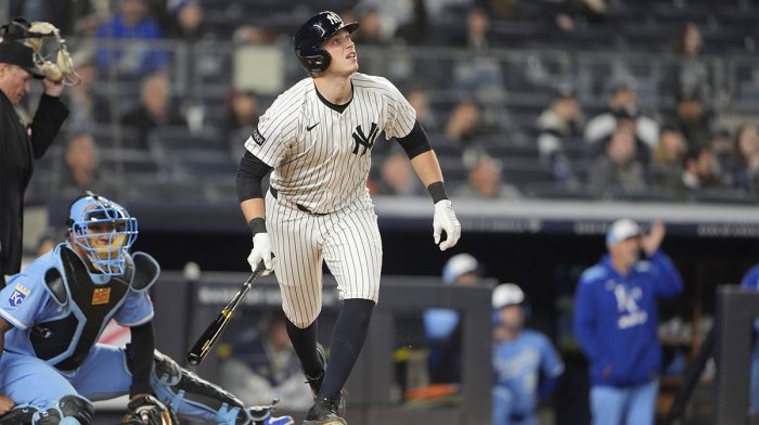 New York Yankees designated hitter Ben Rice (22) watches his home run against the Kansas City Royals during the fifth inning at Yankee Stadium.