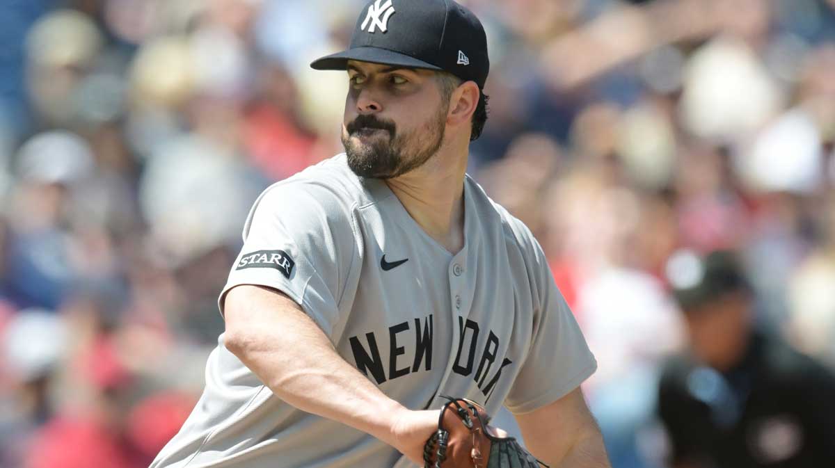 Apr 23, 2025; Cleveland, Ohio, USA; New York Yankees starting pitcher Carlos Rodon (55) throws a pitch during the first inning against the Cleveland Guardians at Progressive Field. Mandatory Credit: Ken Blaze-Imagn Images