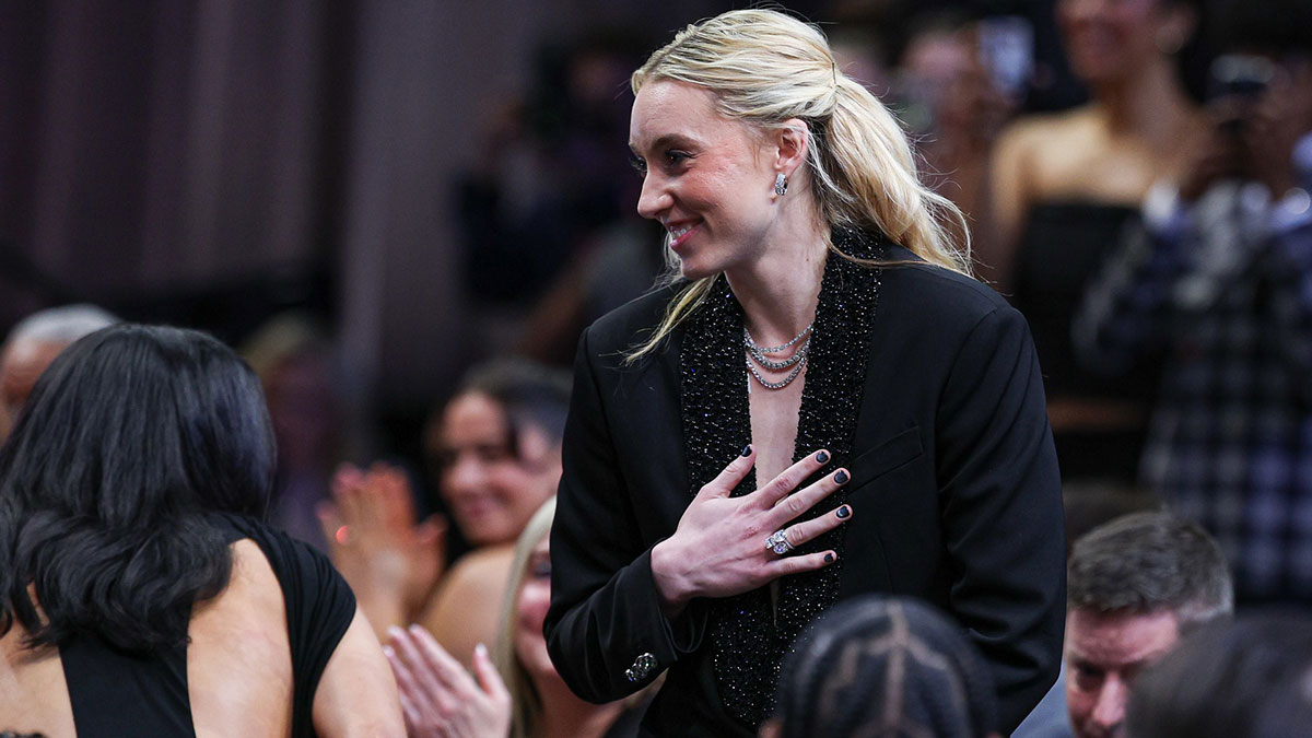 Paige Bueckers reacts after being selected with the number one overall pick to the Dallas Wings in the 2025 WNBA Draft.