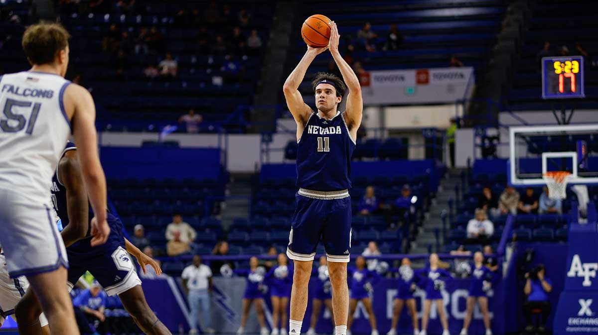 Feb 4, 2025; Colorado Springs, Colorado, USA; Nevada Wolf Pack forward Nick Davidson (11) attempts a shot in the second half against the Air Force Falcons at Clune Arena.