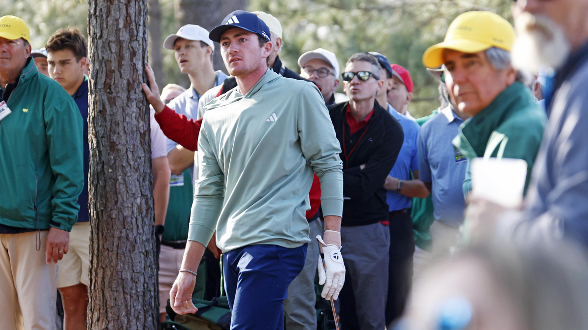 Apr 10, 2025; Augusta, Georgia, USA; Nick Dunlap plays from the pine straw on the first fairway during the first round of the Masters Tournament
