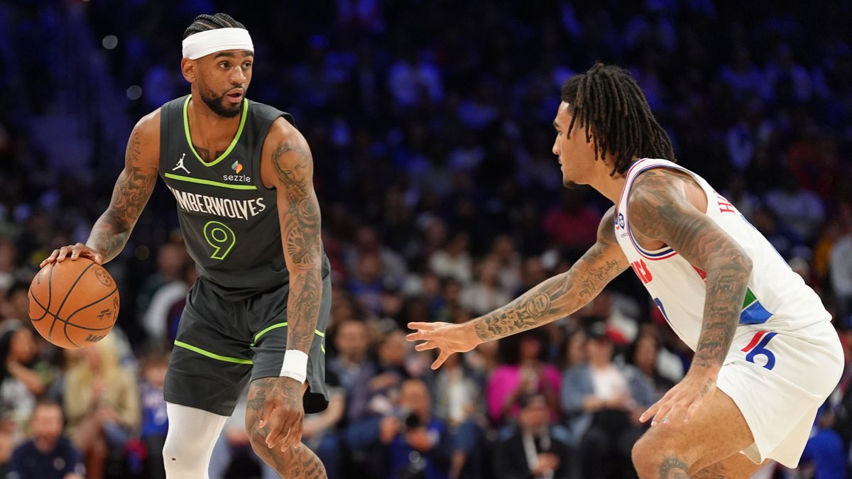 Minnesota Timberwolves guard Nickeil Alexander-Walker (9) controls the ball against the Philadelphia 76ers in the third quarter at Wells Fargo Center.