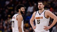 Denver Nuggets guard Jamal Murray (27) reacts after a call as center Nikola Jokic (15) looks on in the third quarter against the Portland Trail Blazers at Ball Arena.
