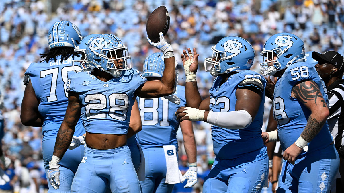 North Carolina Tar Heels running back Omarion Hampton (28) with the ball after scoring a touchdown in the second quarter at Kenan Memorial Stadium. Mandatory Credit: Bob Donnan-Imagn Images