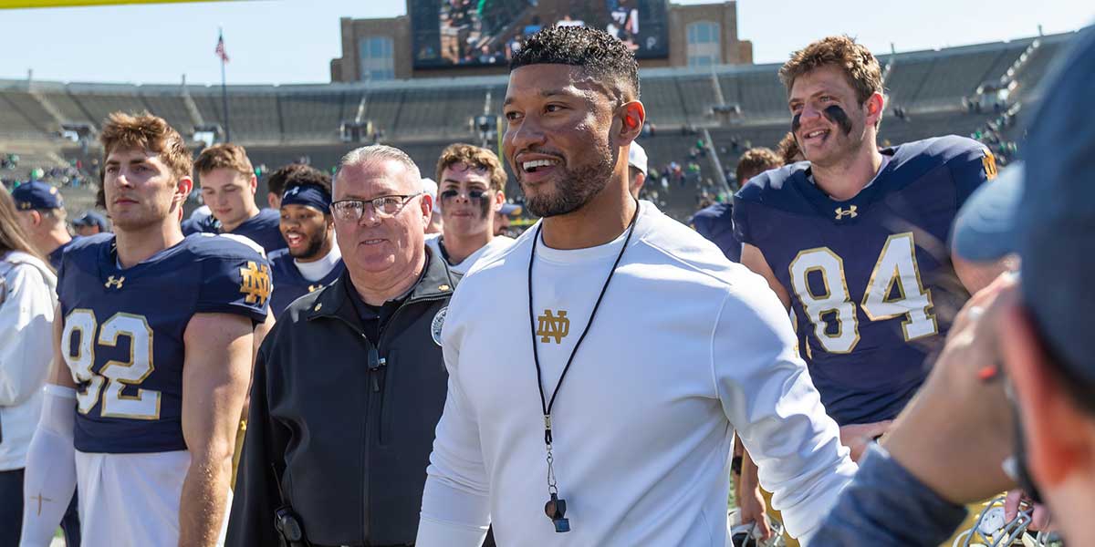 Notre Dame Fighting Irish head coach Marcus Freeman smiles as he walks off the field after the Blue-Gold game at Notre Dame Stadium.