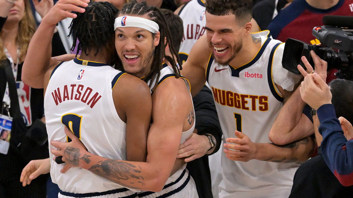 Denver Nuggets forward Aaron Gordon (32) is congratulated by forward Peyton Watson (8) and forward Michael Porter Jr. (1) after the game winning dunk to defeat the Los Angeles Clippers 101-99 in game four of round one of the 2024 NBA Playoffs at Intuit Dome.