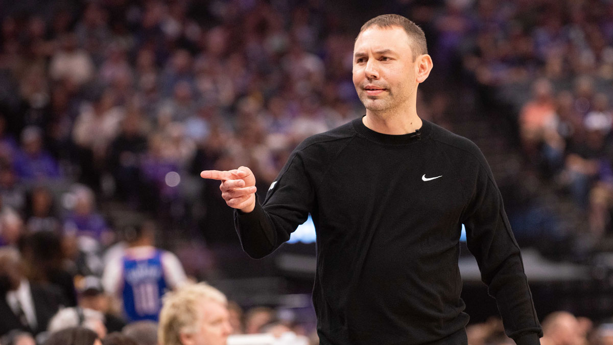 Denver Nuggets interim head coach David Adelman points to his bench during the first quarter of the game against the Sacramento Kings at Golden 1 Center.