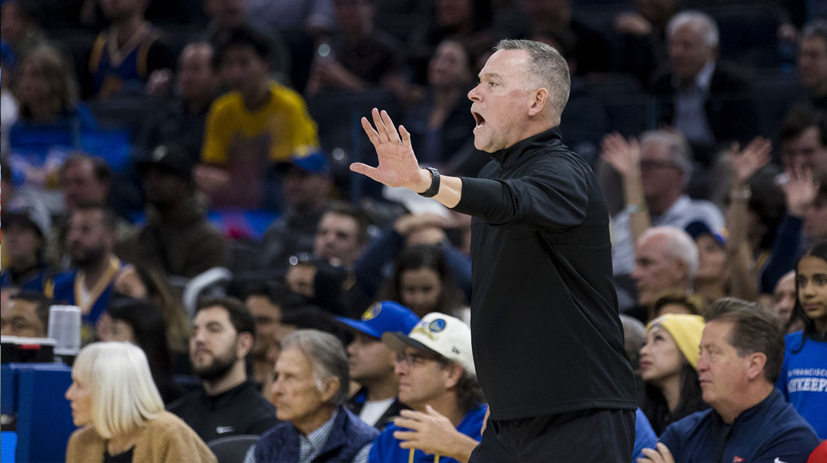 Denver Nuggets' head coach Mike Malone made gestures during the second half of the match against the Golden State Warriors at the Chase Center.
