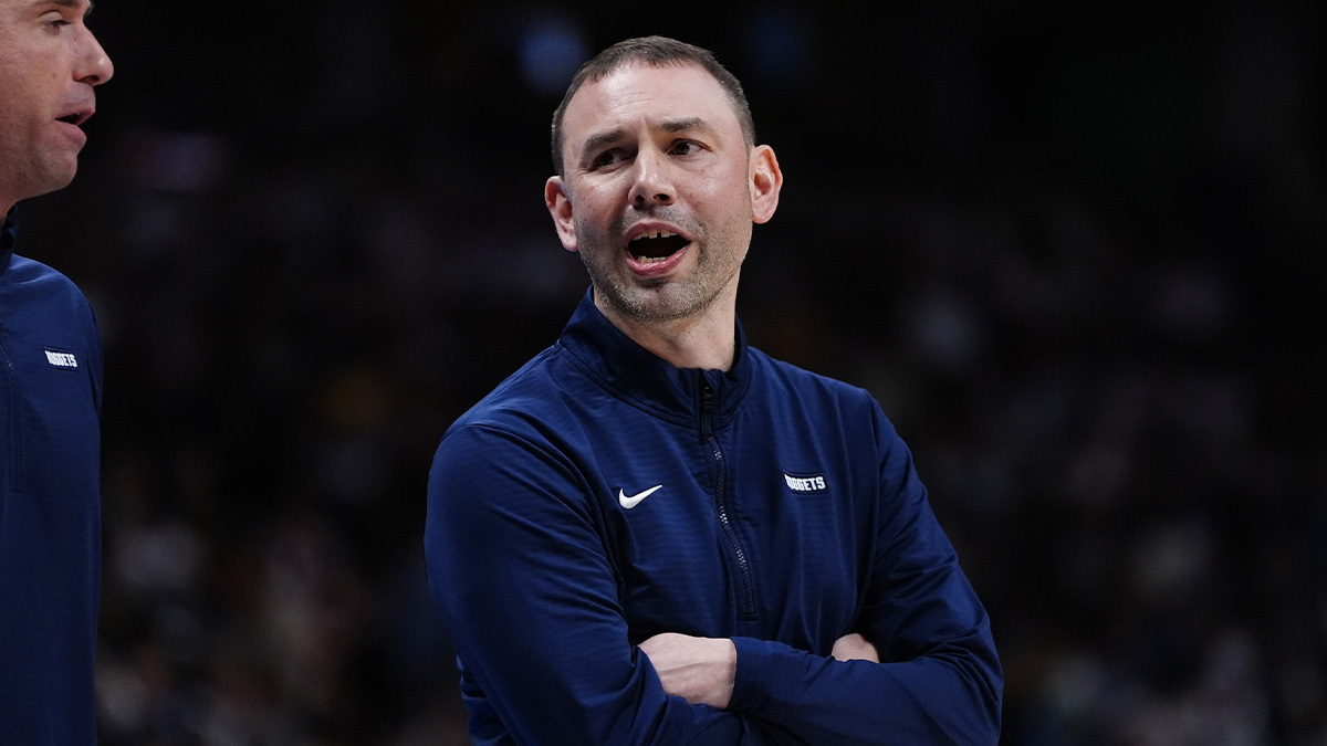 Denver Nuggets interim head coach David Adelman calls out in the second quarter against the Memphis Grizzlies at Ball Arena.