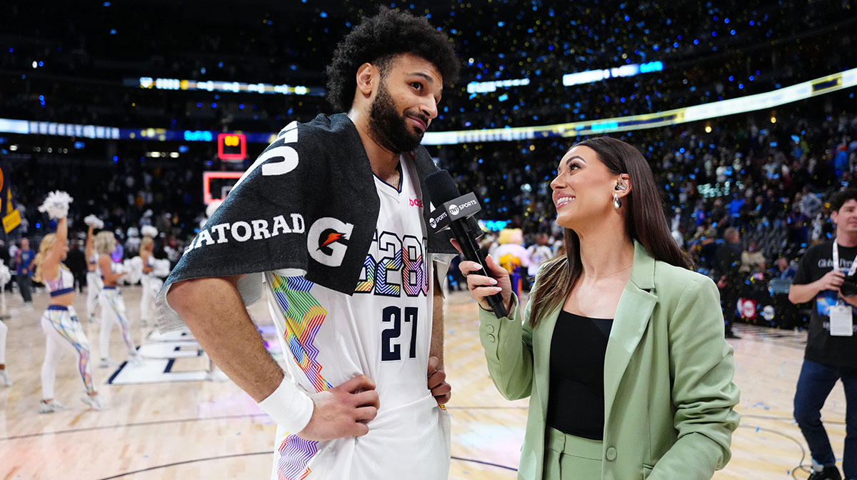 Denver Nuggets guard Jamal Murray (27) is interviewed by TNT broadcaster Lauren Jbara following a win against the LA Clippers during game five of the first round for the 2025 NBA Playoffs at Ball Arena.