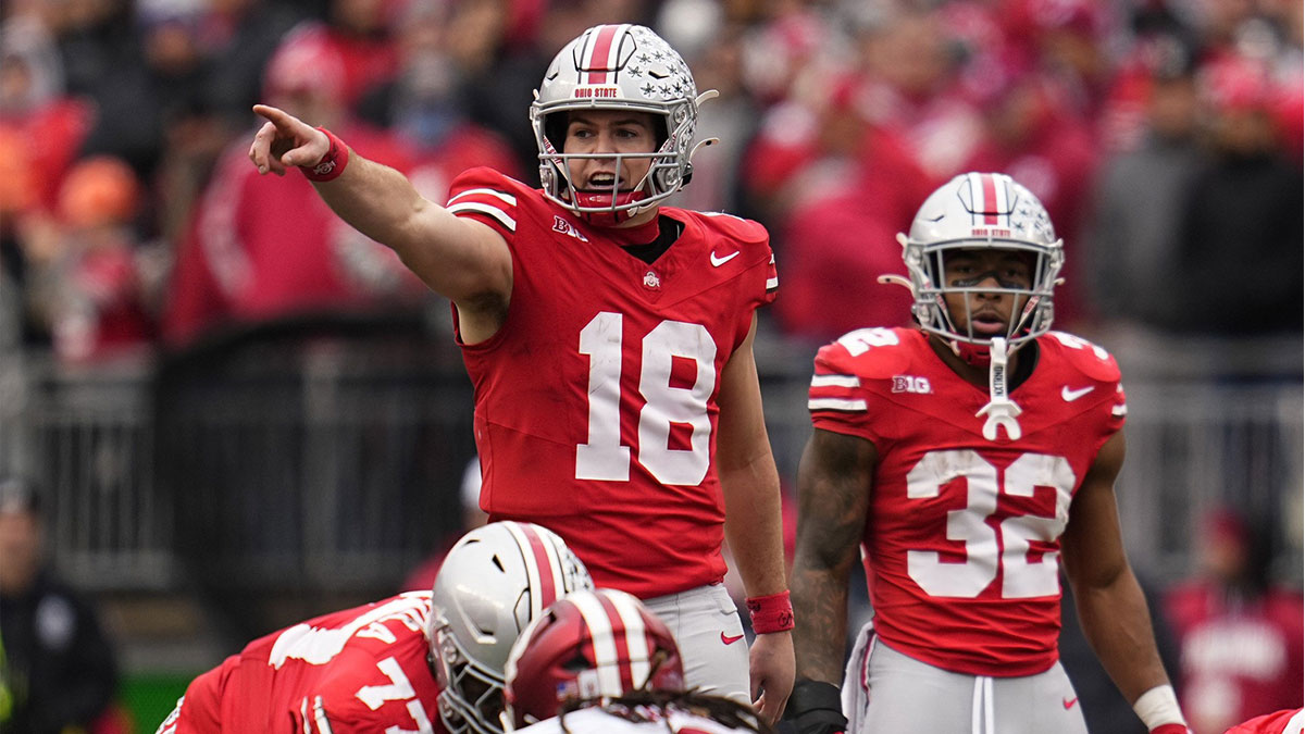 Ohio State Buckeyes quarterback Will Howard (18) signals to his offense during the second half of the NCAA football game against the Indiana Hoosiers at Ohio Stadium in Columbus on Saturday, Nov. 23, 2024. Ohio State won 38-15.