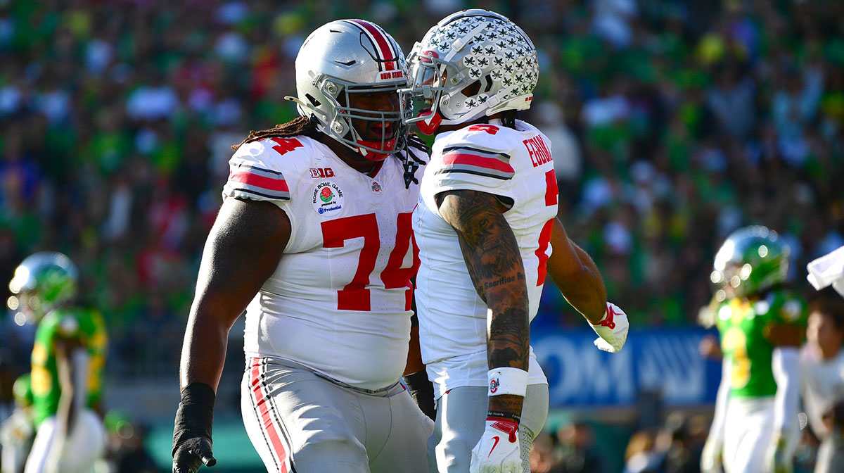 Ohio State Buckeyes wide receiver Emeka Egbuka (2) celebrates with offensive lineman Donovan Jackson (74) after a touchdown in the first quarter against the Oregon Ducks in the 2025 Rose Bowl college football quarterfinal game at Rose Bowl Stadium.