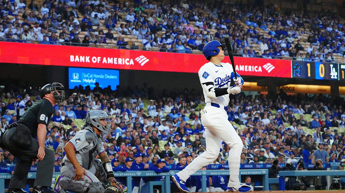 Los Angeles Dodgers designated hitter Shohei Ohtani (17) hits a home run during the first inning against the Miami Marlins at Dodger Stadium.