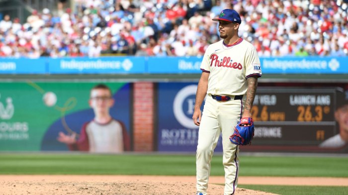 Philadelphia Phillies pitcher Orion Kerkering (50) reacts after allowing a three-run home run during the eighth inning against the Miami Marlins at Citizens Bank Park.