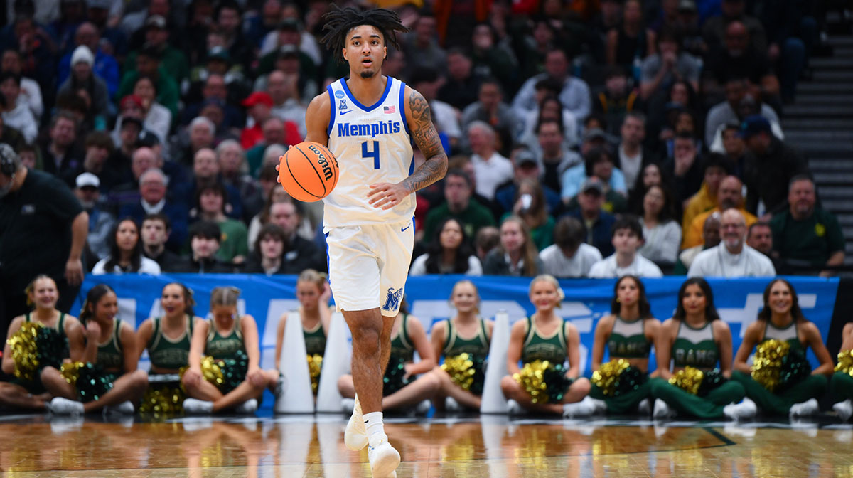 Memphis Tigers guard PJ Haggerty (4) drives the ball during the second half against Colorado State Rams at Climate Pledge Arena.