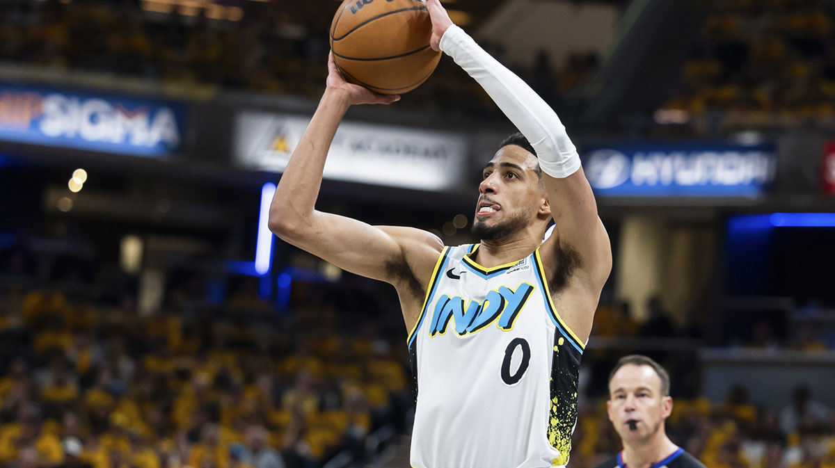 Indiana Pacers guard Tyrese Haliburton (0) shoots the ball in the second half against the Milwaukee Bucks at Gainbridge Fieldhouse.