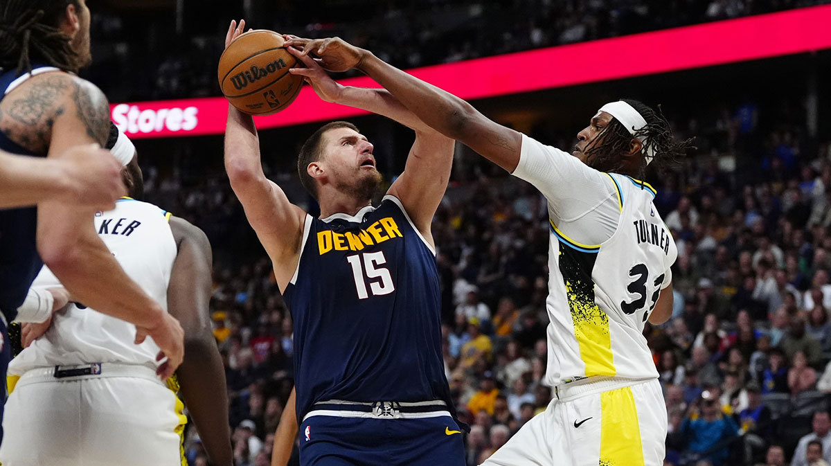 Pacers center Myles Turner (33) defends