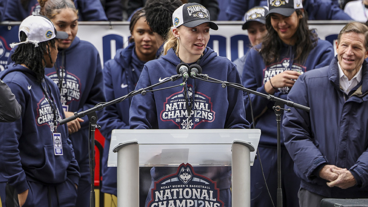 UConn student-athlete Paige Bueckers addresses the crowd during the Final Four champions victory parade and rally outside of the XL Center in Hartford, CT.