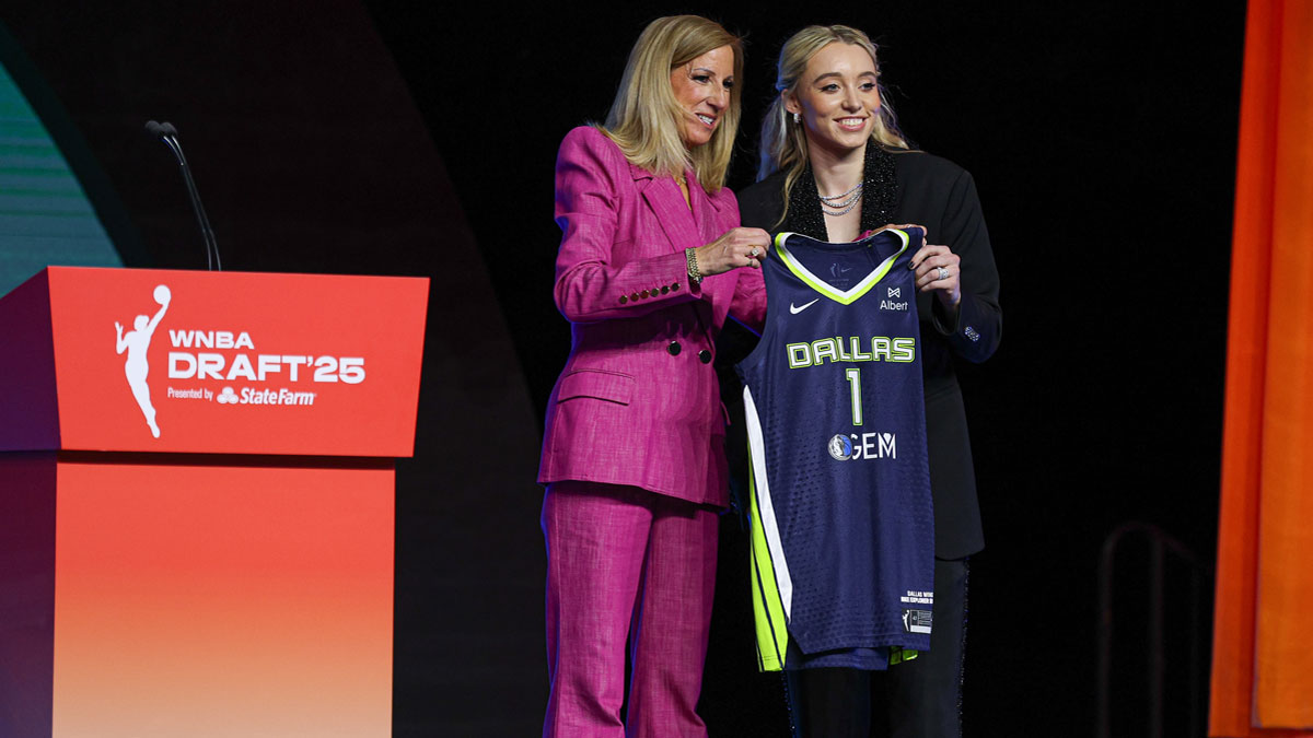 Paige Bueckers poses with WNBA commissioner Cathy Engelbert after being selected with the number one overall pick to the Dallas Wings in the 2025 WNBA Draft.