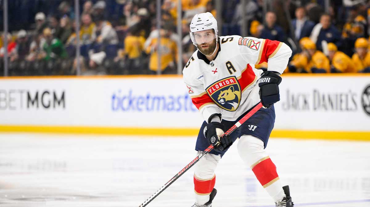 Florida Panthers defenseman Aaron Ekblad (5) skates with the puck against the Nashville Predators during the second period at Bridgestone Arena.