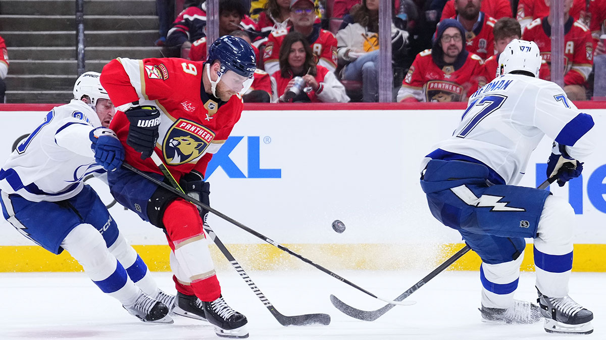 Florida Panthers center Sam Bennett (9) controls the puck against Tampa Bay Lightning defenseman Victor Hedman (77) during the third period in game four of the first round of the 2025 Stanley Cup Playoffs at Amerant Bank Arena.