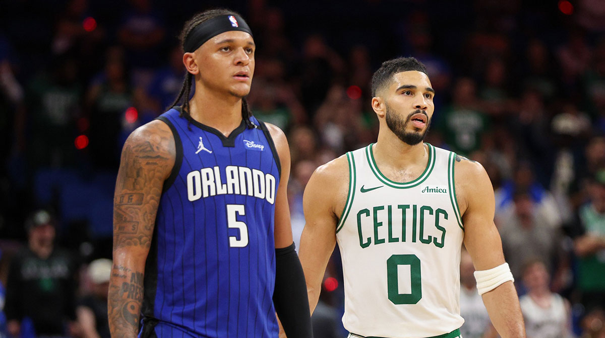 Orlando Magic forward Paolo Banchero (5) and Boston Celtics forward Jayson Tatum (0) wait fro a break in play in the fourth quarter during game four of first round for the 2025 NBA Playoffs at Kia Center.
