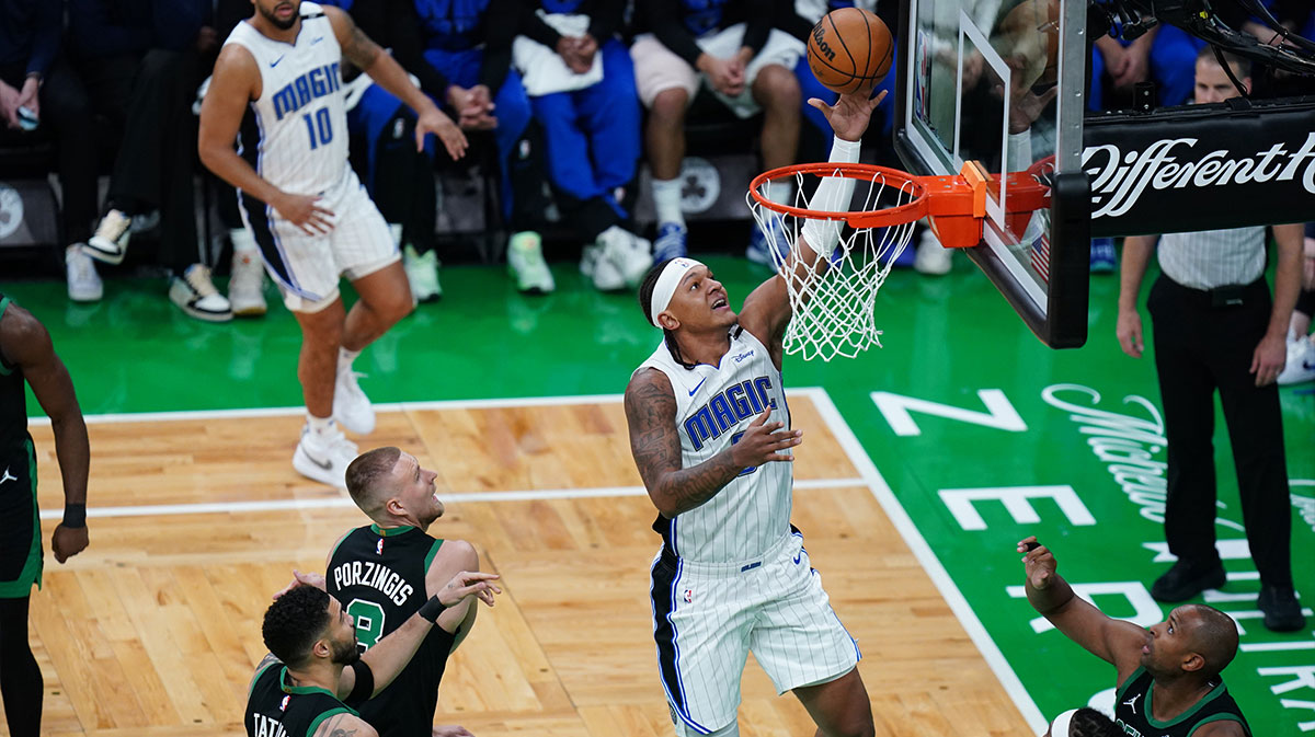 Orlando Magic forward Paolo Banchero (5) drives the ball to the basket against the Boston Celtics in the first quarter during game five of first round for the 2025 NBA Playoffs at TD Garden.