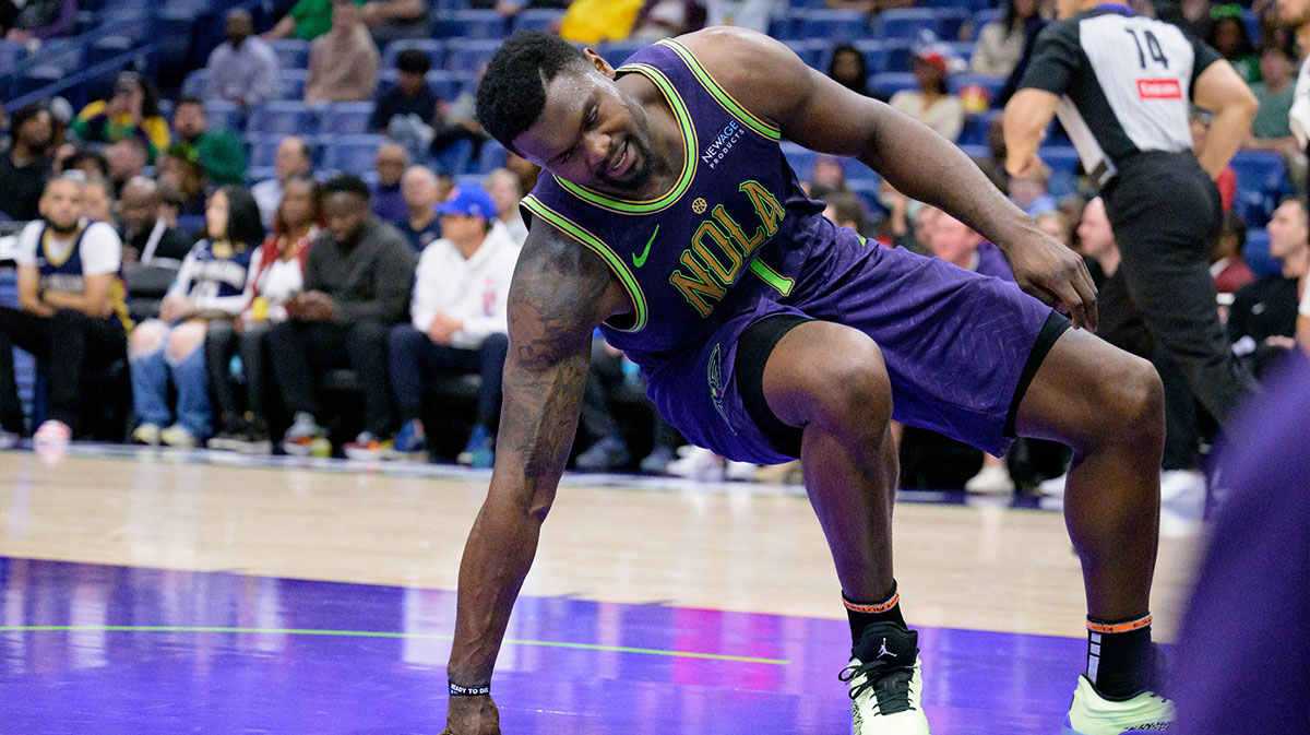 New Orleans Pelicans forward Zion Williamson (1) reacts after getting up from a missed dunk against the Detroit Pistons during the second half at Smoothie King Center.